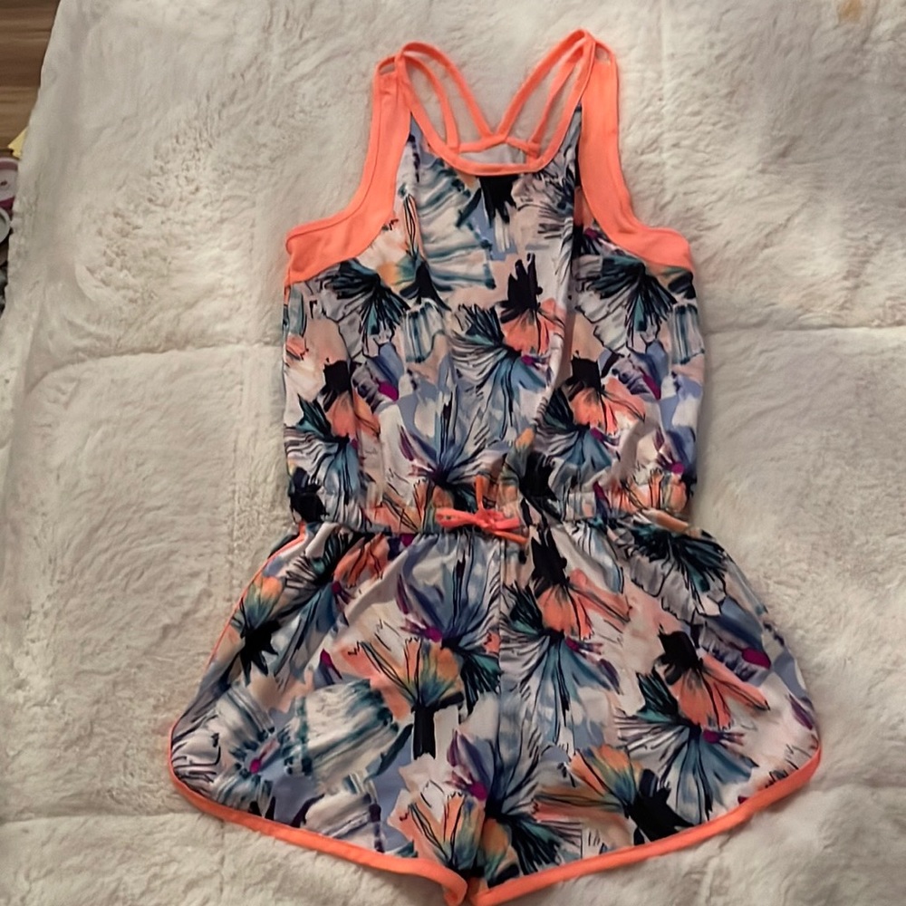 The brand is athletic, the size is kids XL 10/12, color is pink
